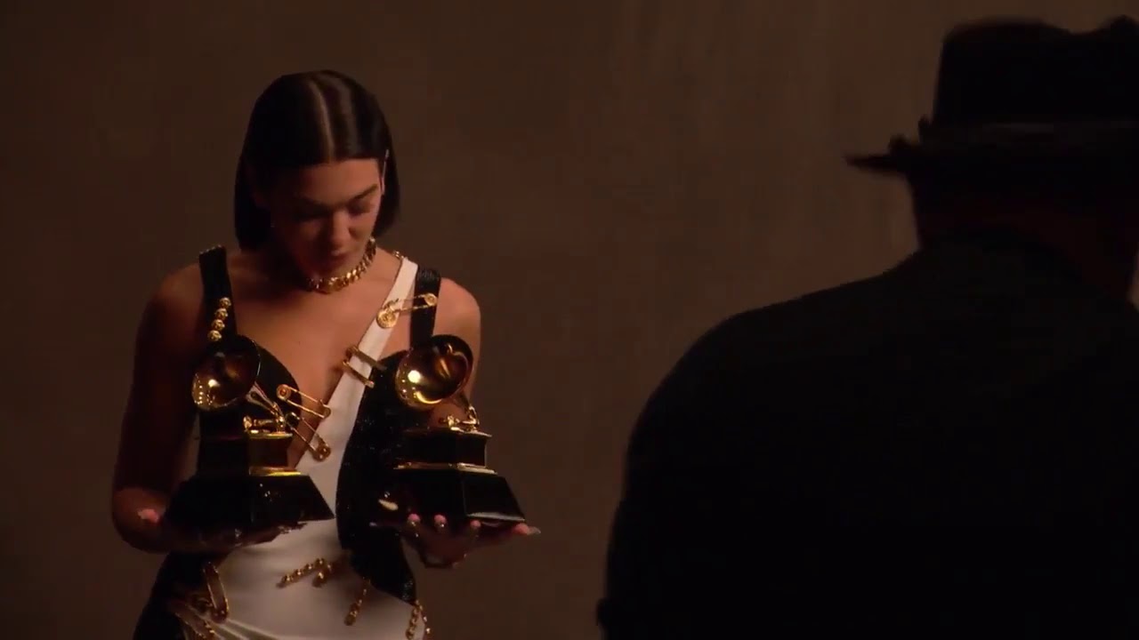 Dua Lipa poses with her #GRAMMYs backstage
