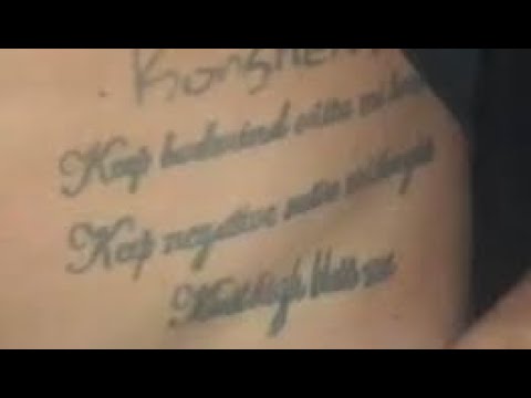 Konshens big fan tattoos lyrics on stomach!! Respect