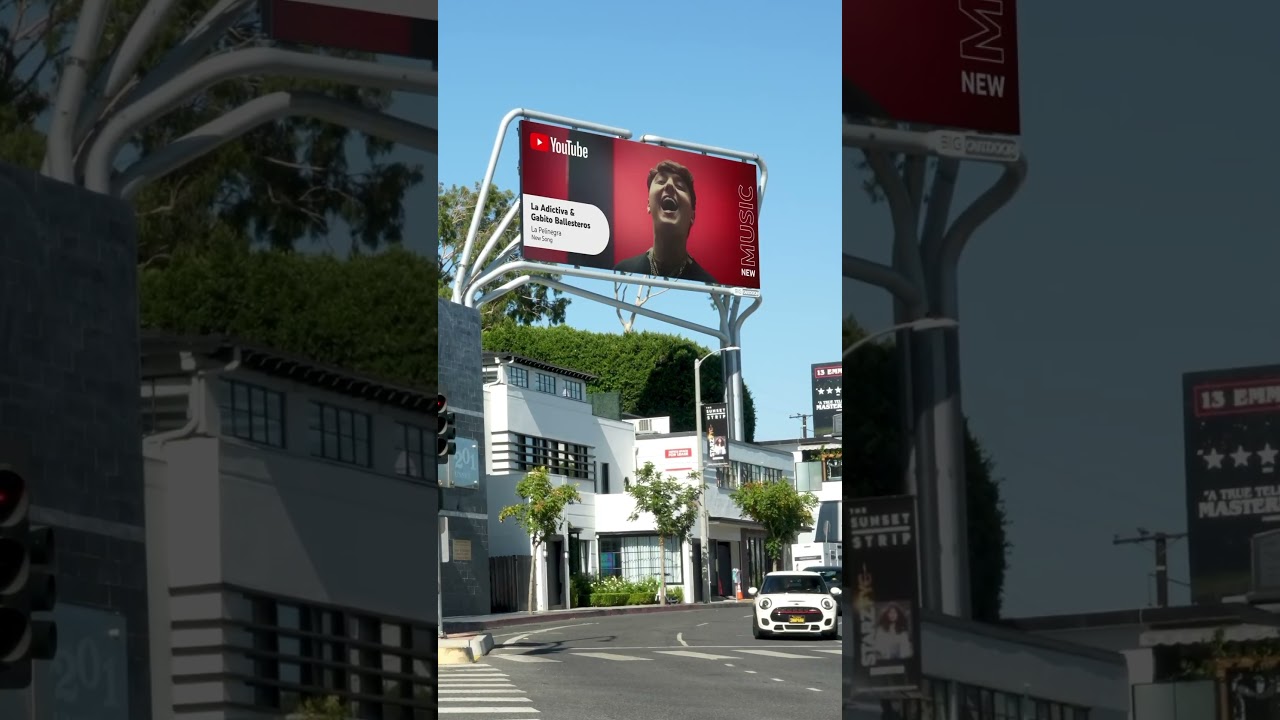 Así amanecieron las calles de #LA 🏙️con #LaPelinegra🖤 en este billboard de @YouTubeMusic  😎💣