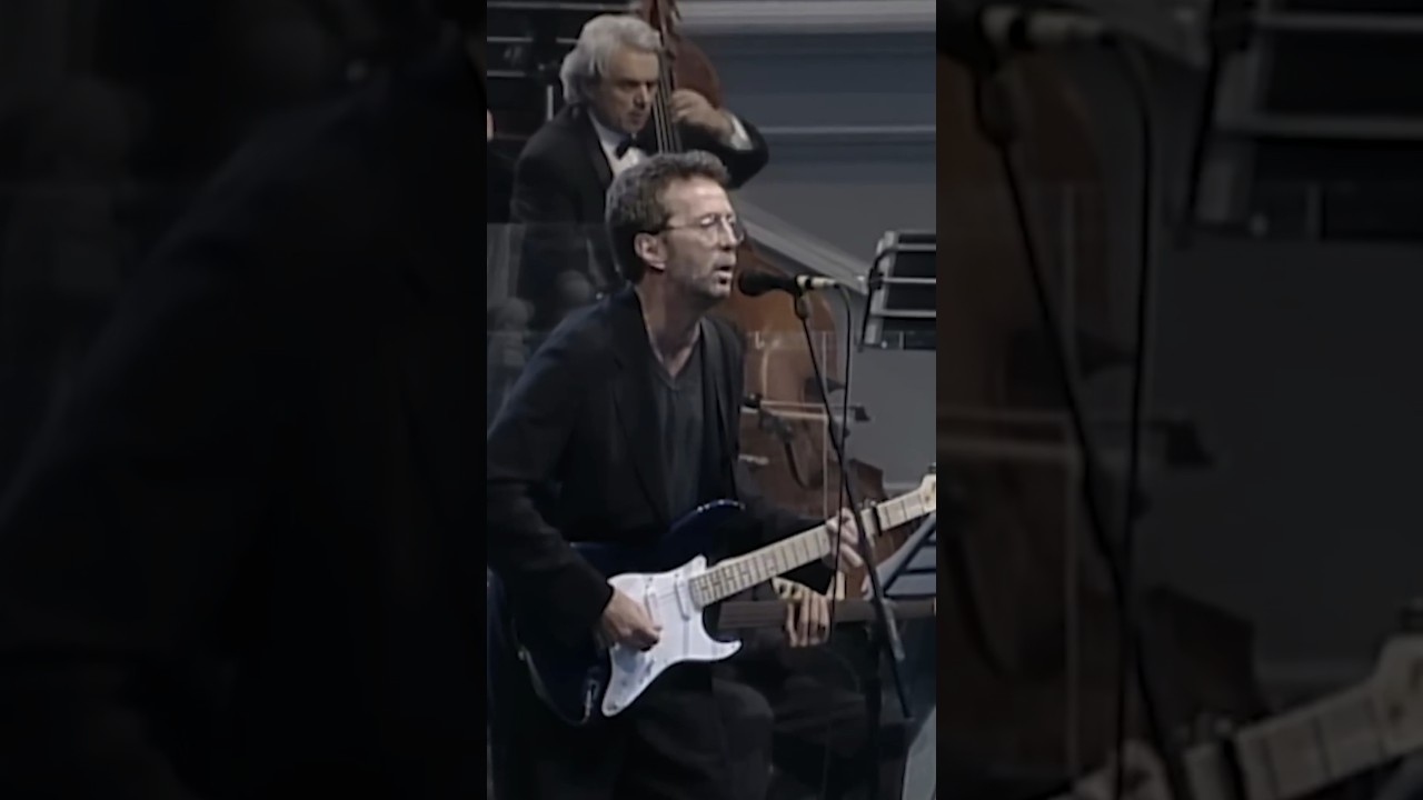 Eric Clapton and Luciano Pavarotti perform "Holy Mother"